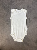 Size 1 older coloured bodysuit- no tag